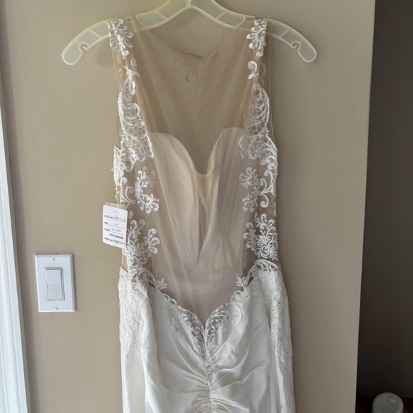 Elegant White Wedding Dress with Sheer Back - Picture 3 of 5